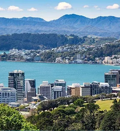 Cairns waterfront with green mountains behind