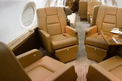 Gulfstream G350 cabin with tan leather seats