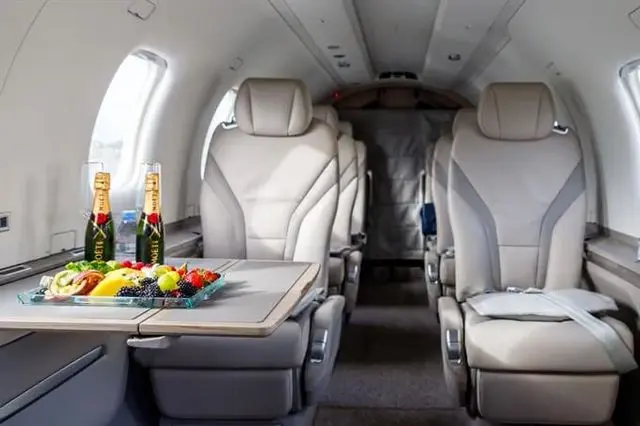 Pilatus PC-12 cabin with leather seats and refreshments