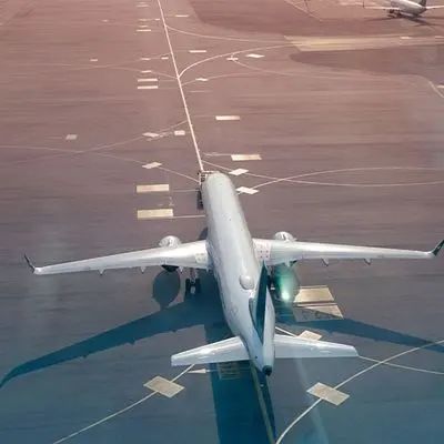 Jet aircraft on a runway preparing for take-off